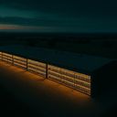 A large building illuminated by warm lights at
