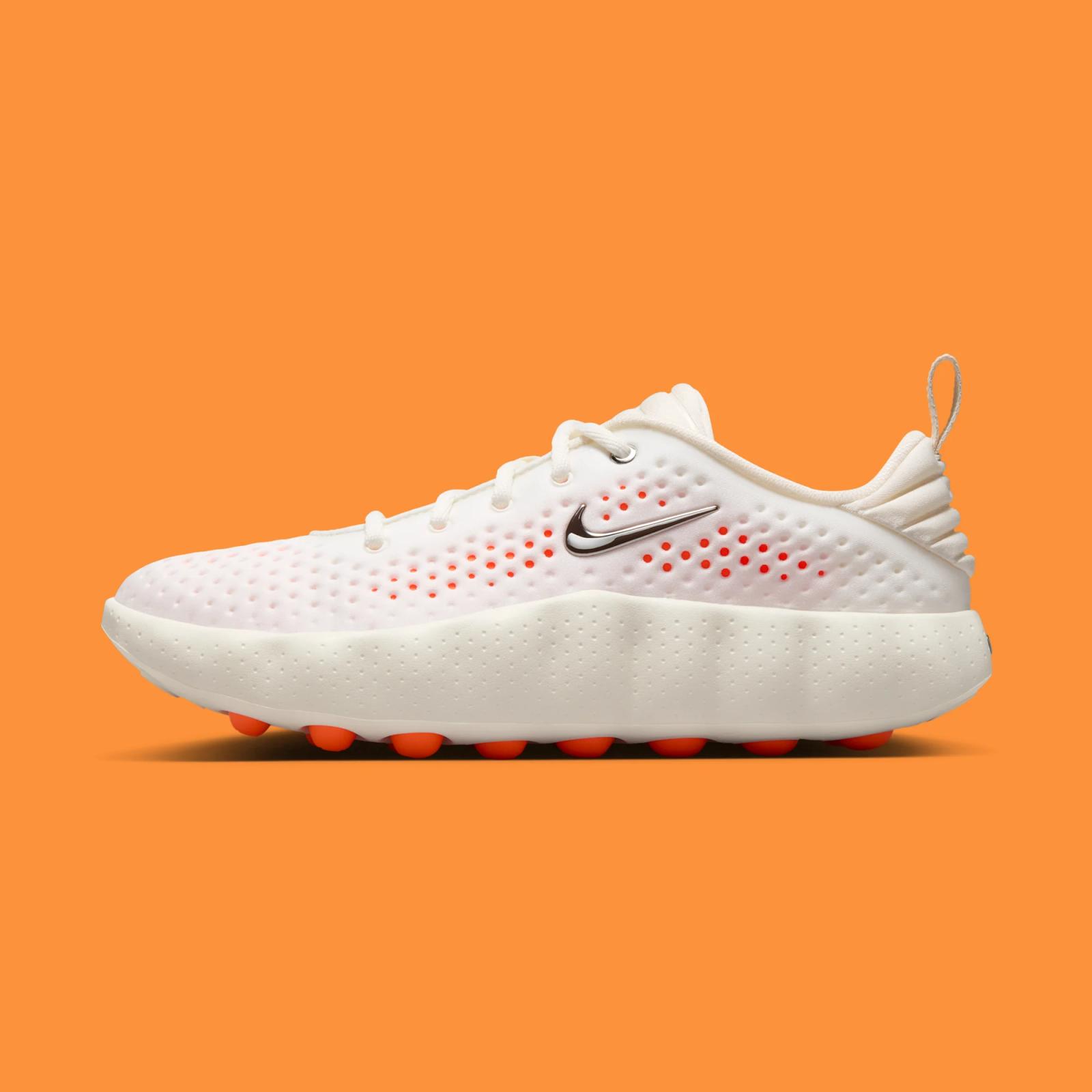 Nike Mind 002 W "Sail & Hyper Crimson" drops April 2nd, 2026yper Crimson" drops April 2nd, 2026