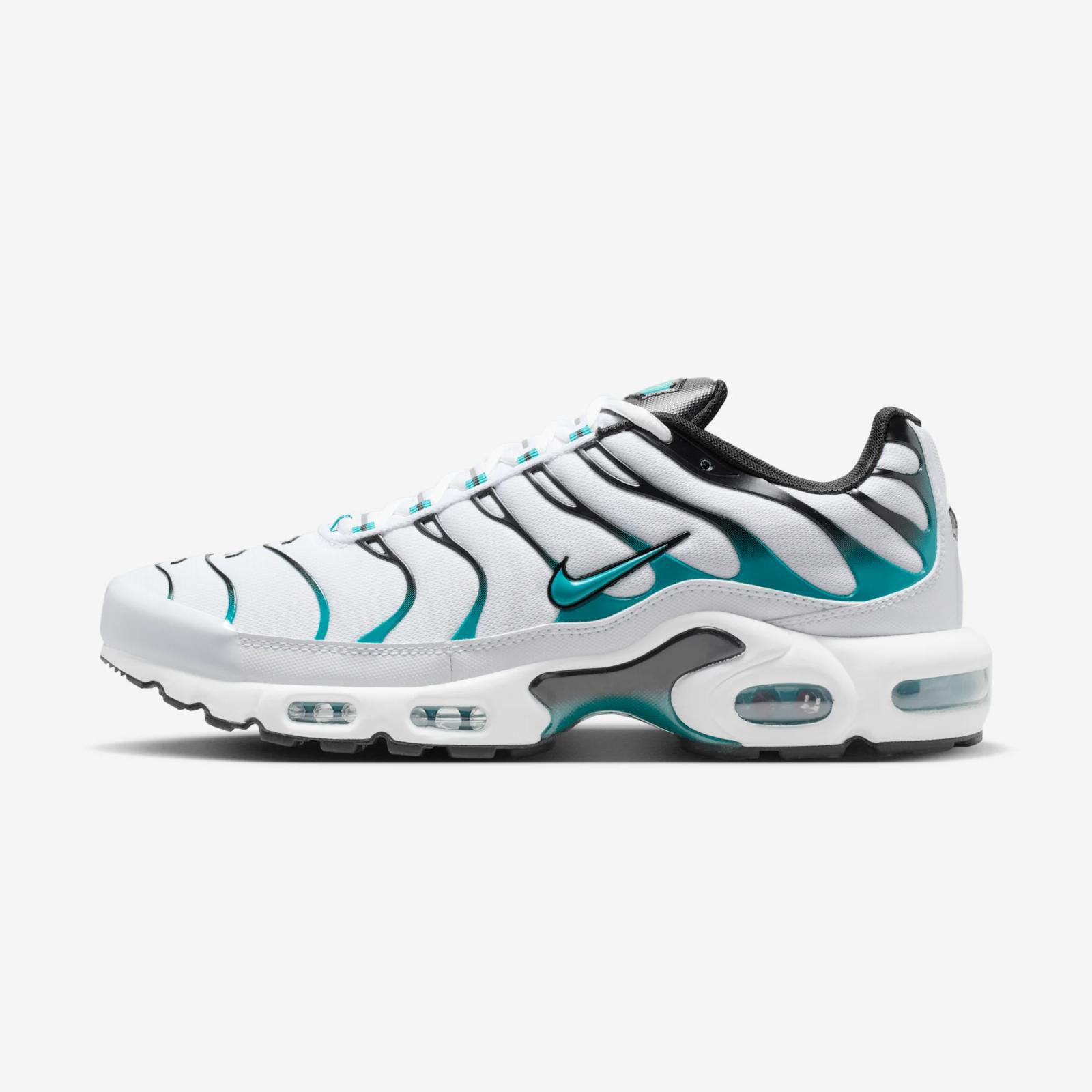 White Nike Air Max Plus sneaker with teal and black accents.