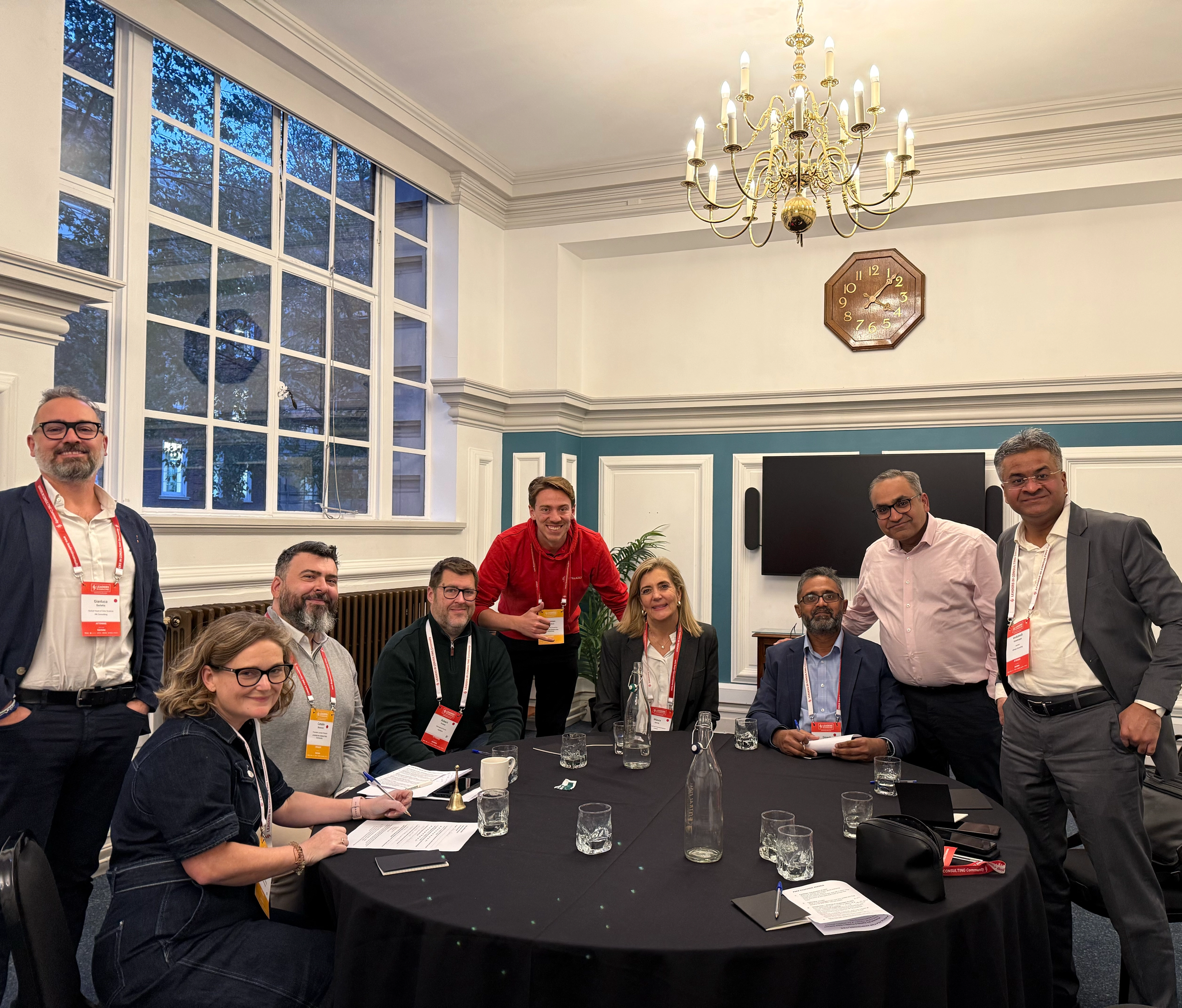 Consulting leaders engaging in a hands-on strategy session at Leaders in Consulting Summit 2026, discussing real-world business growth challenges