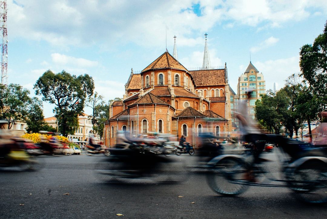 a street with cars and buildings on the side