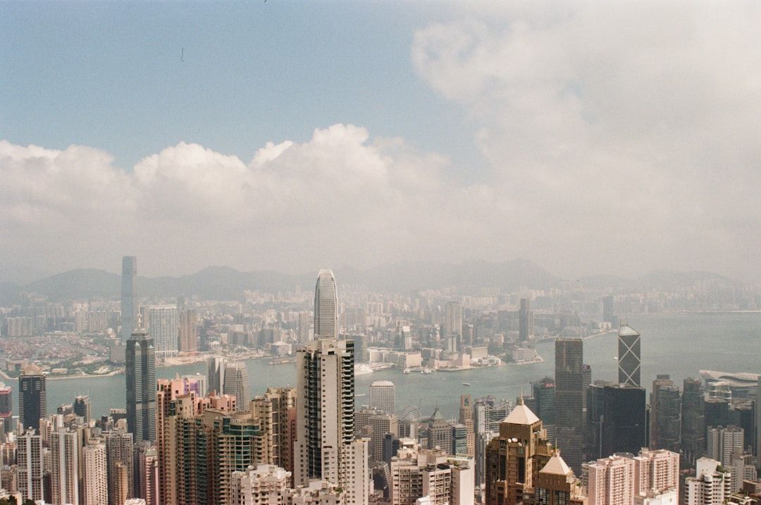 Panoramic view of a dense cityscape with tall buildings.