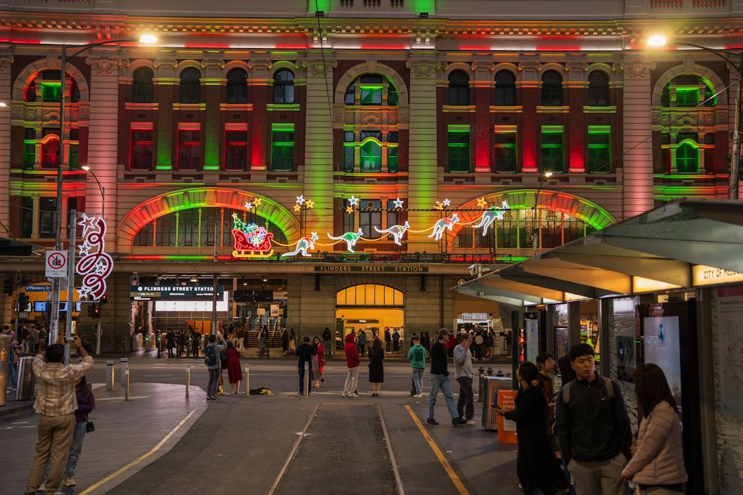 Building decorated with festive christmas lights at night
