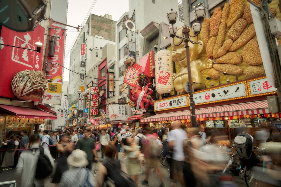 Busy street scene in a japanese city at night