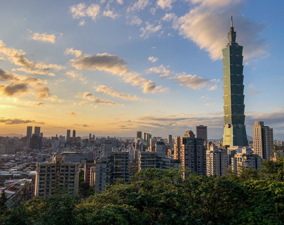 A view of a very tall building in a city