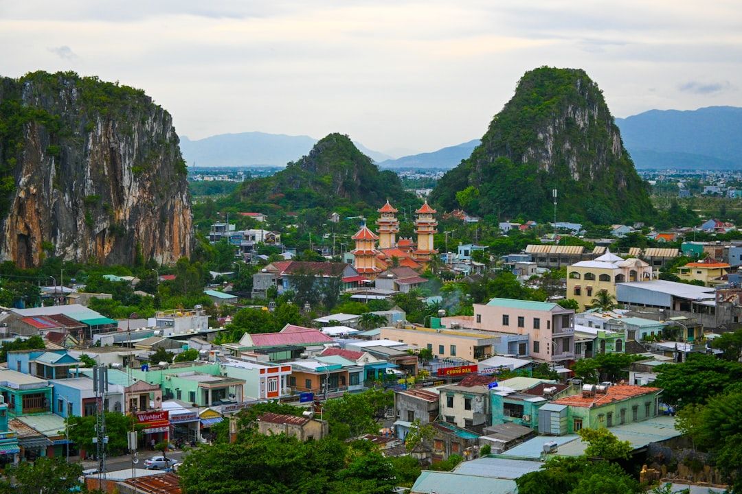 A view of a city with mountains in the background