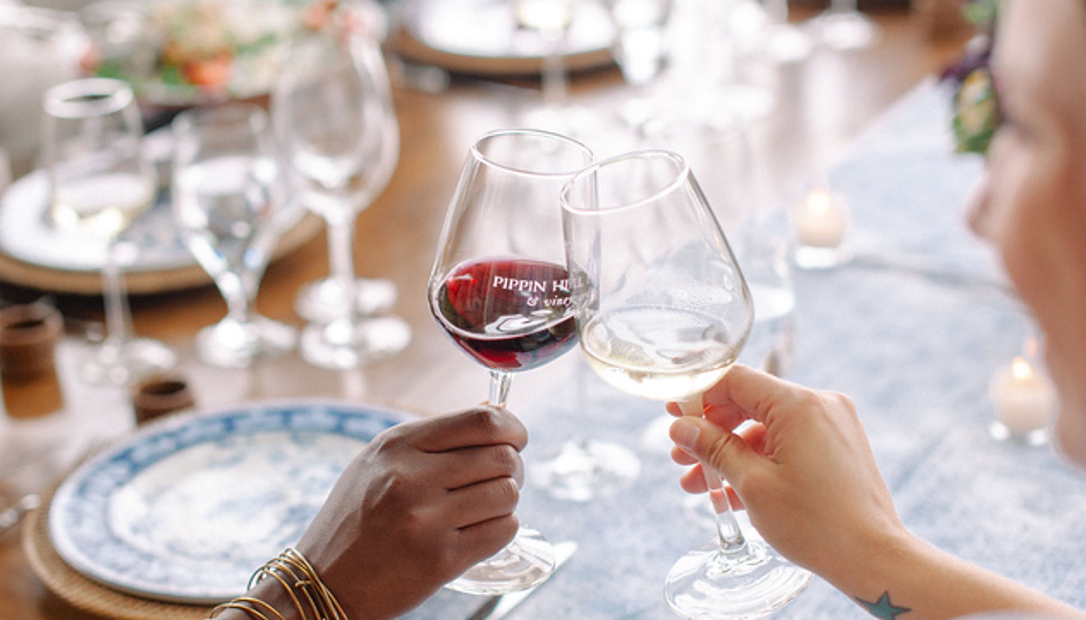 To ladies enjoying a wine tasting at Pippin Hillundefined