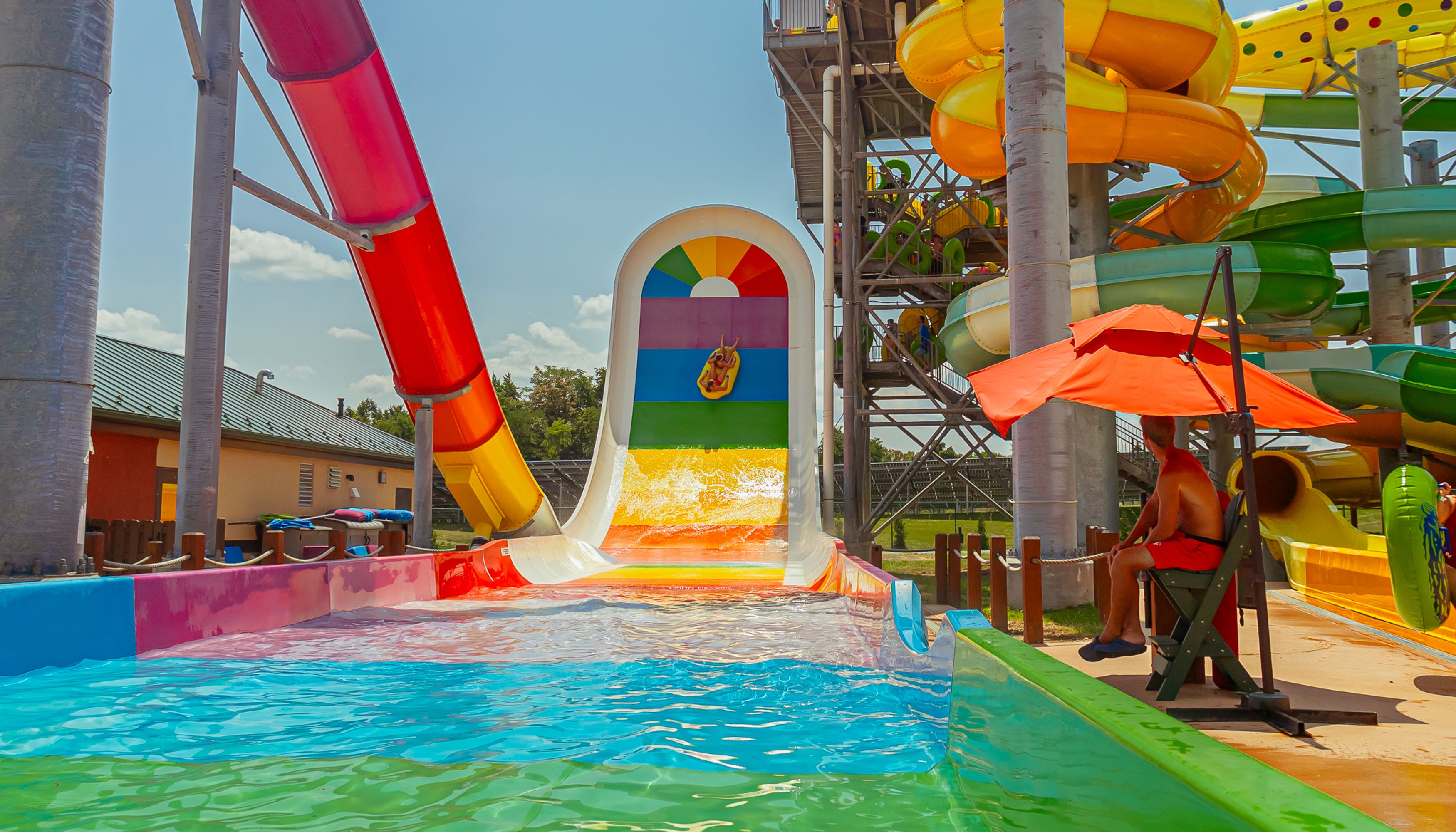 kids enjoying a waterpark slideundefined