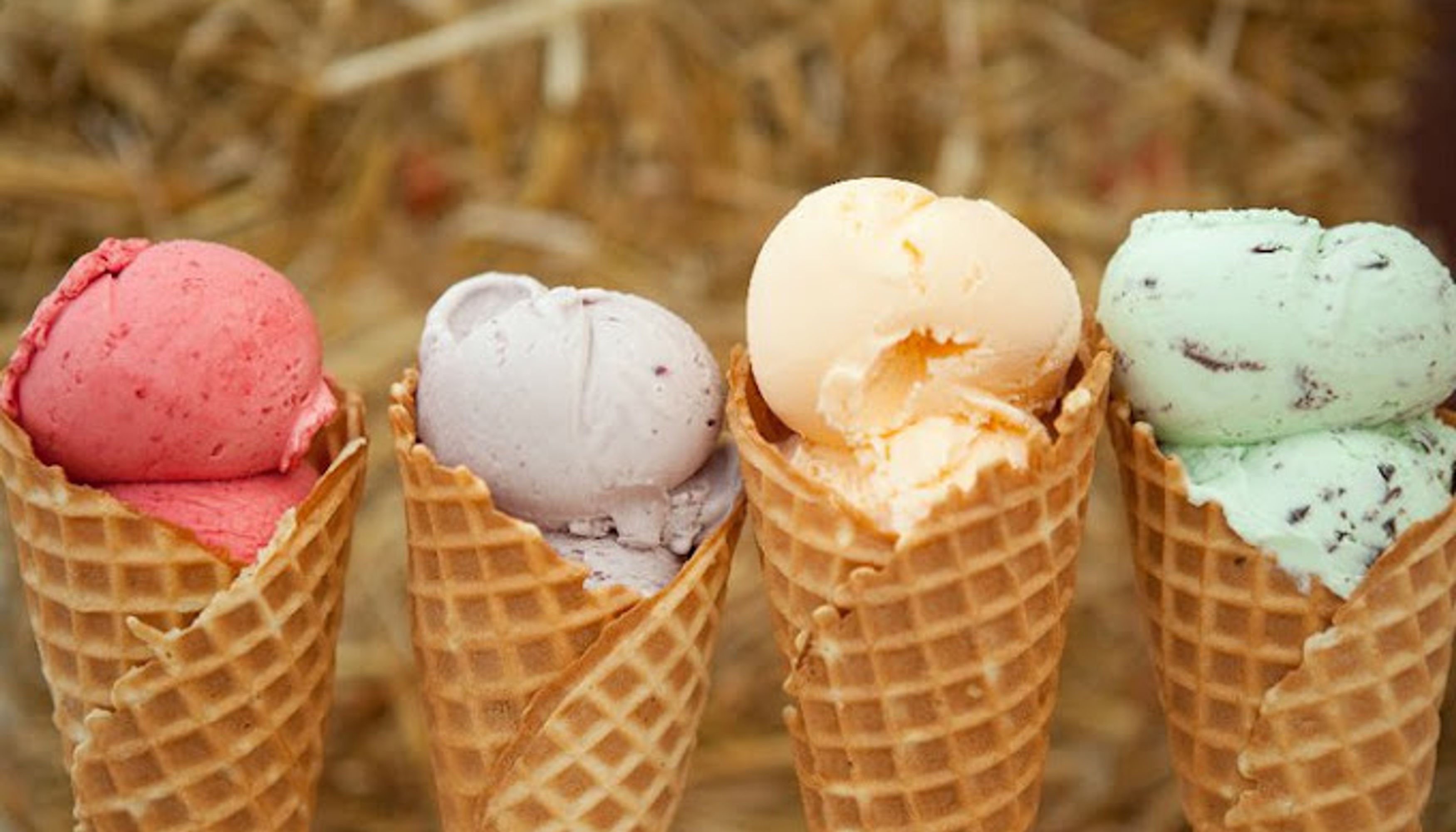 4 waffle cones red, purple, orange and green