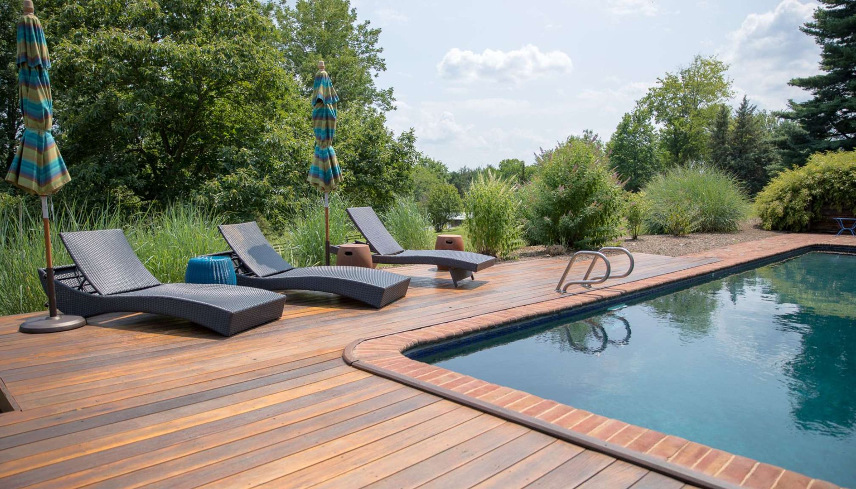 Pool and lounge chairs in rural charlottesville
