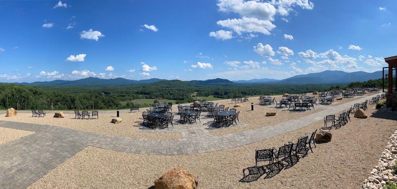 patio furniture in front of mountain view