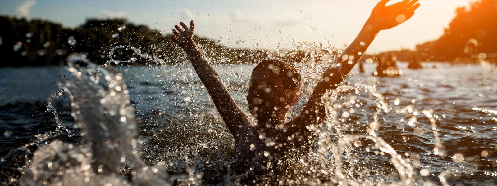 Child swimming in Charlottesville water