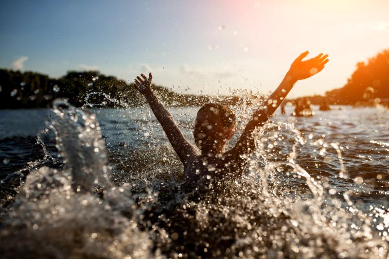 Child swimming in Charlottesville water