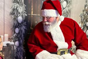 little girl visiting with Santa