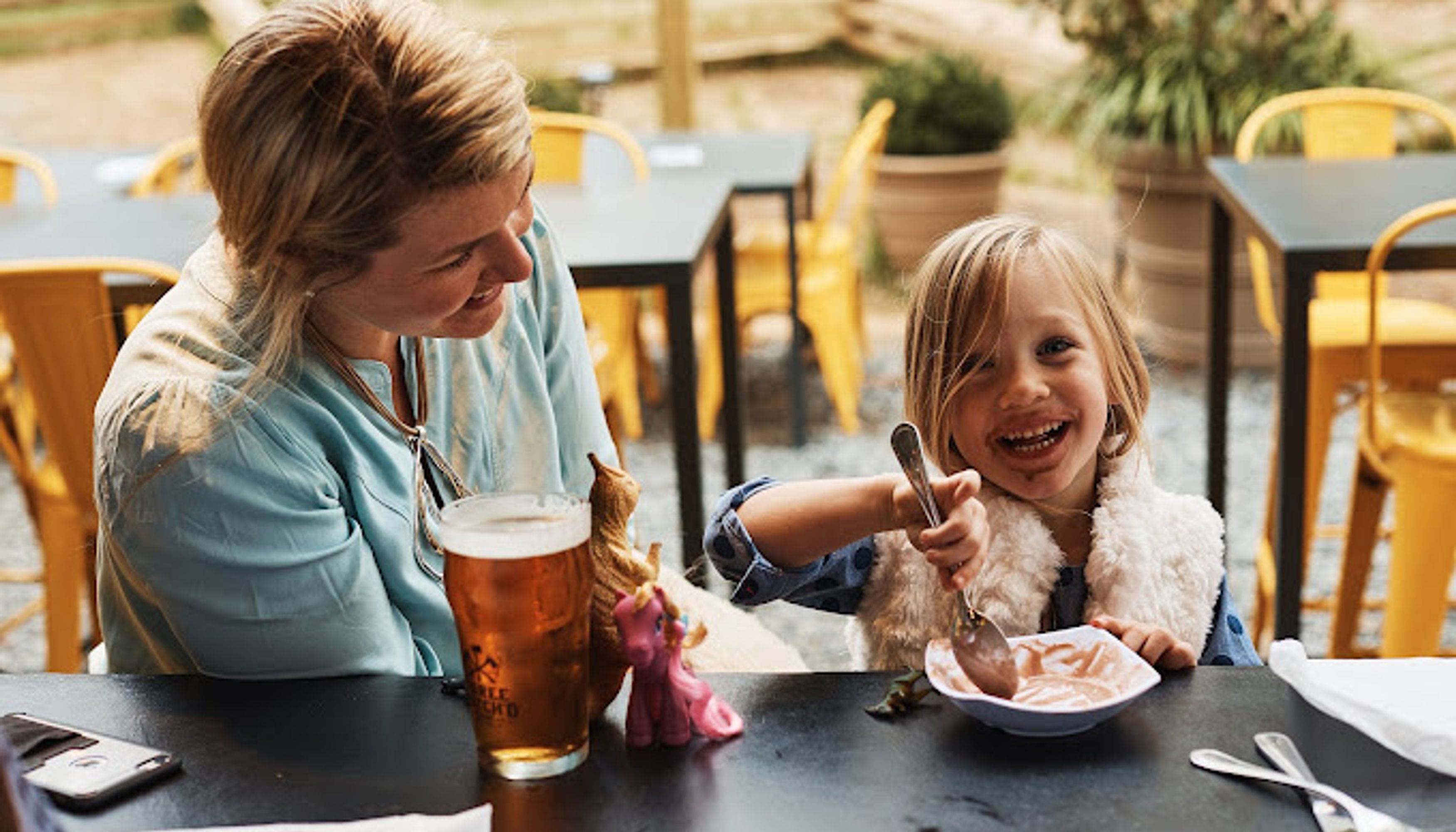Kid eating ice cream at Three Notch'dundefined