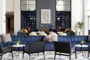 Blue couch in lobby of Charlottesville hotel