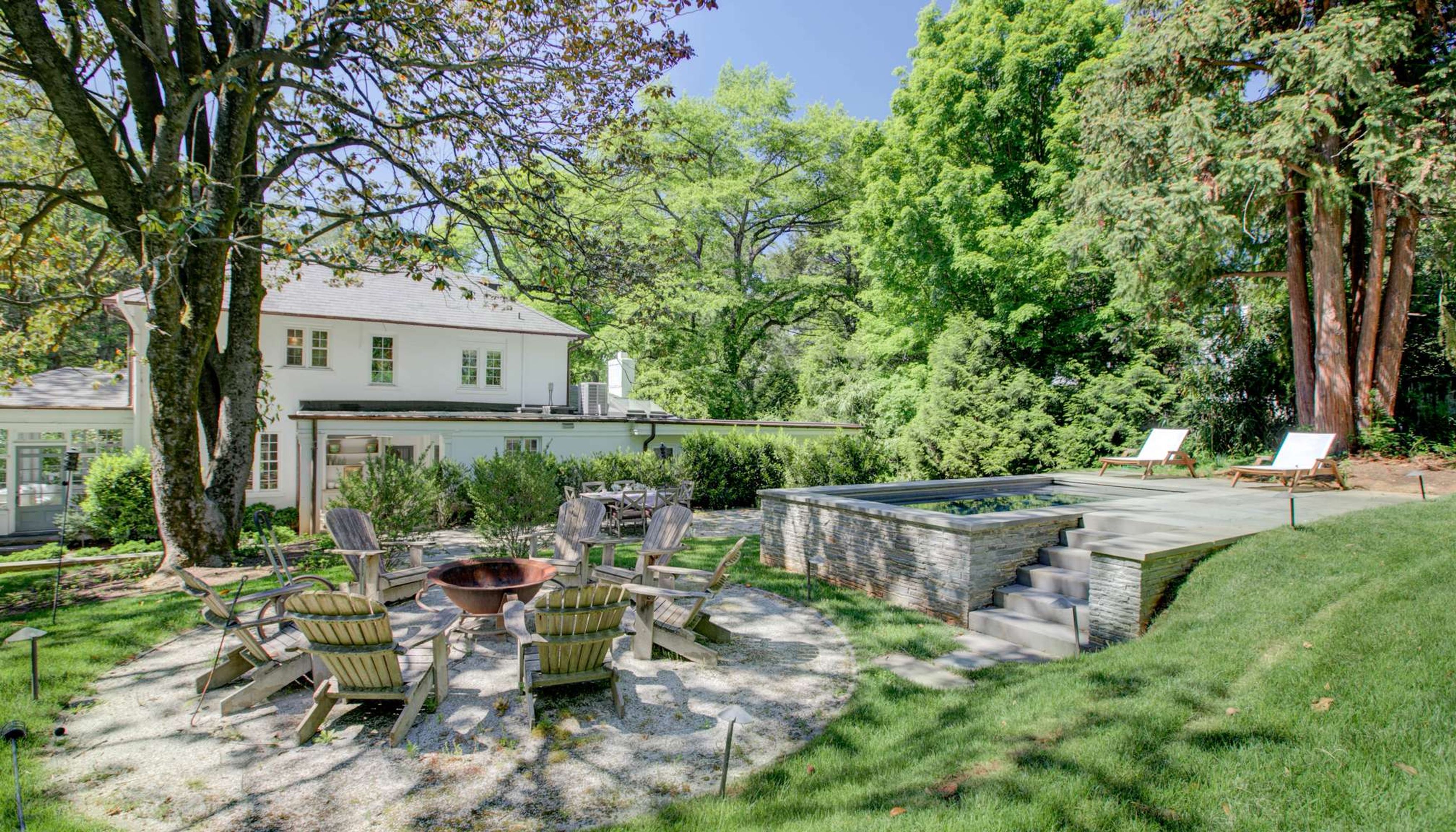 Backyard with firepit and pool