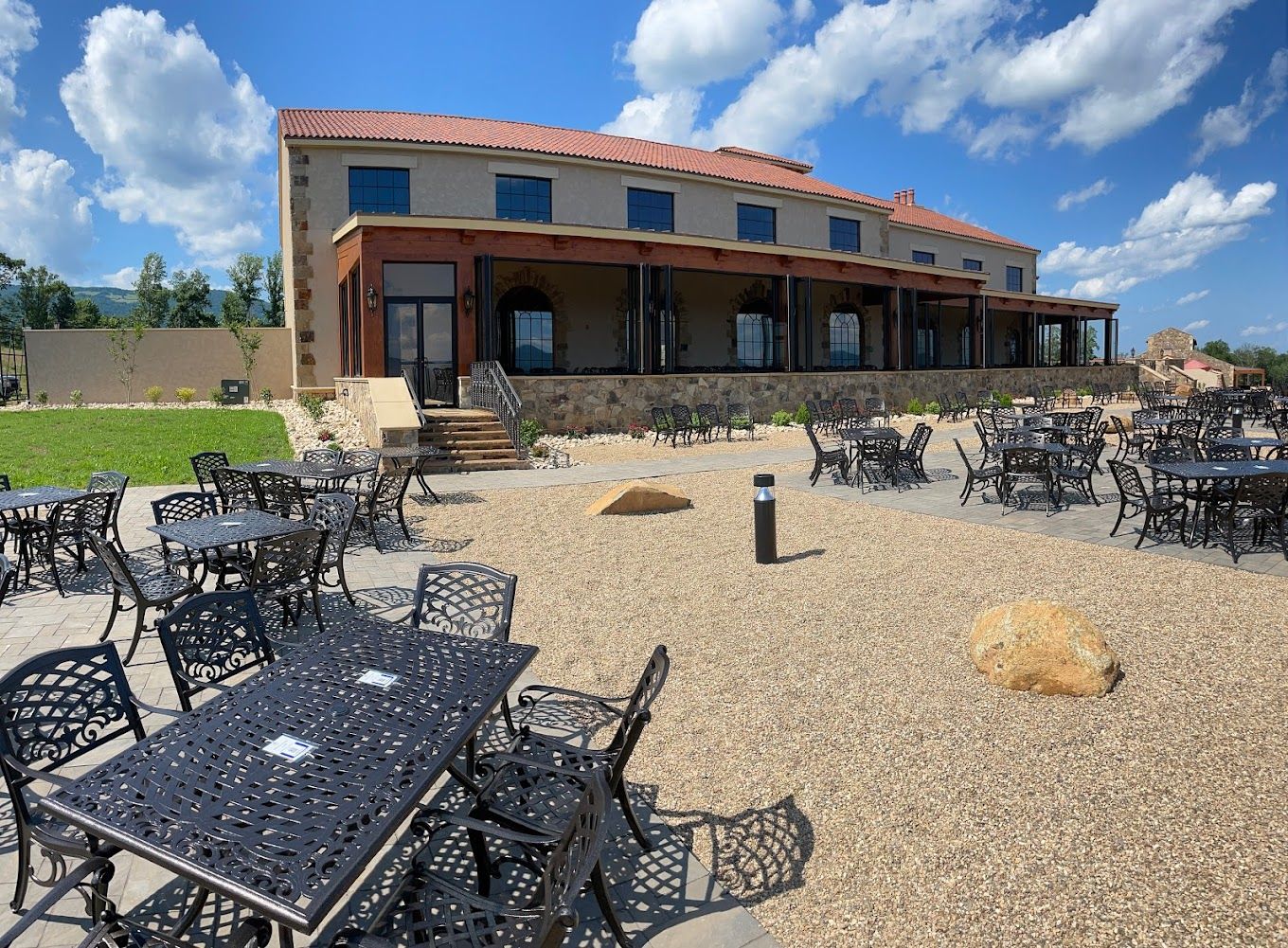 patio funiture in front of tuscan building 