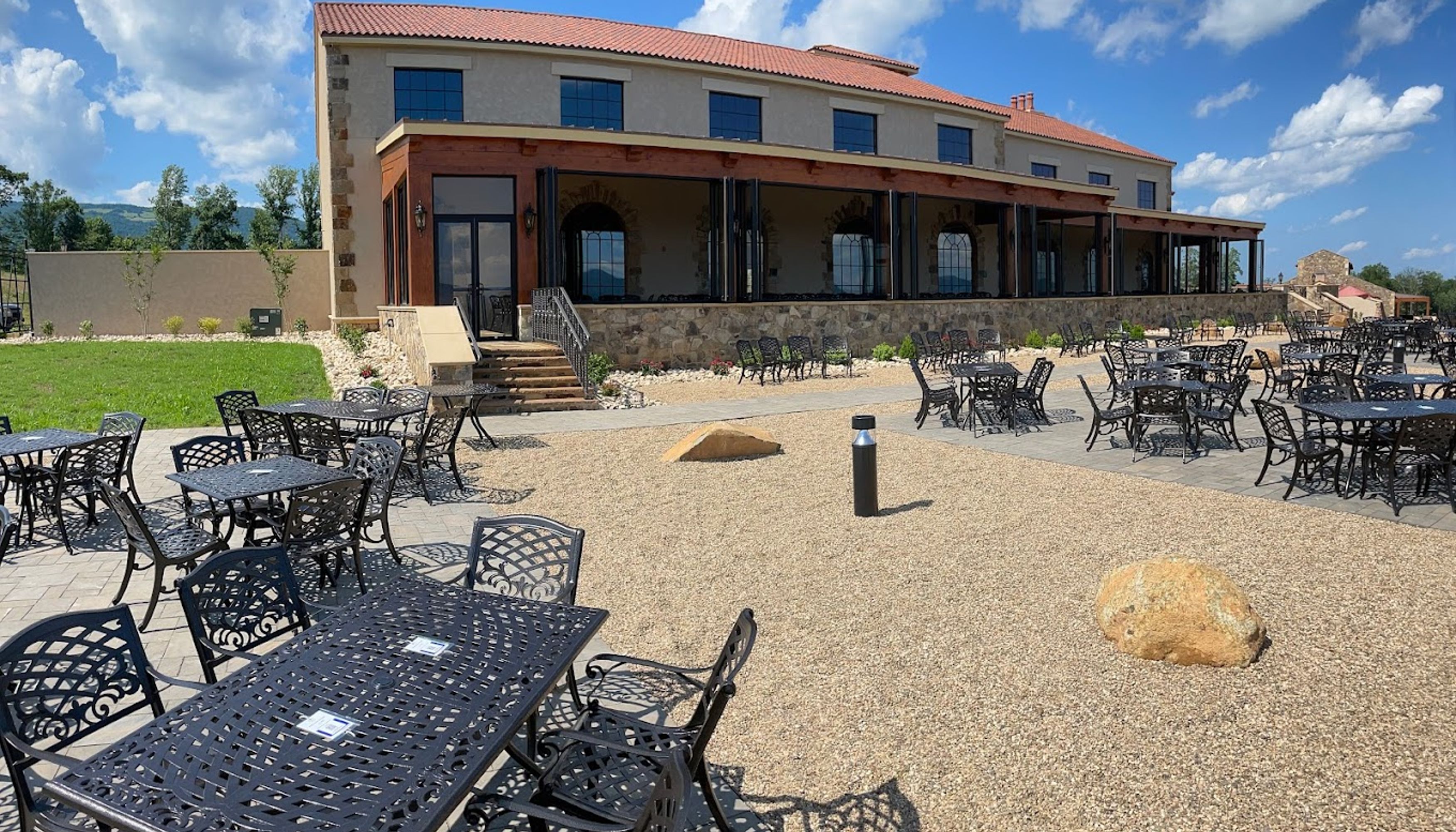 patio funiture in front of tuscan building