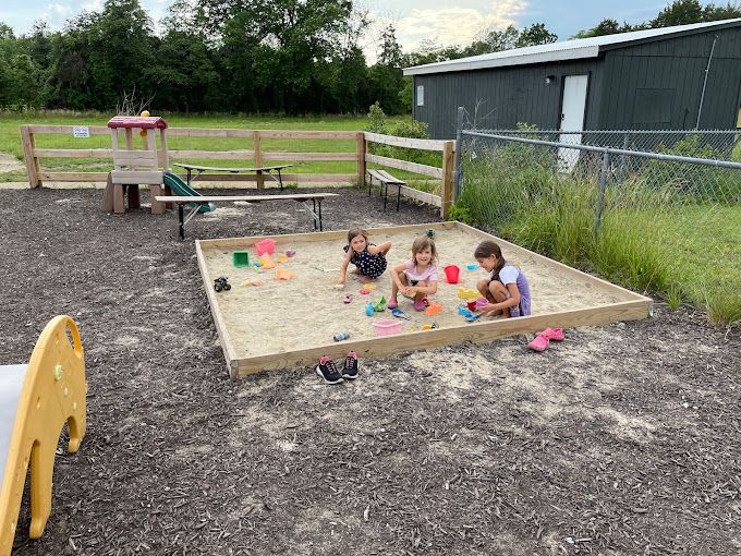 Kids playing in sandbox at Patch Brewing