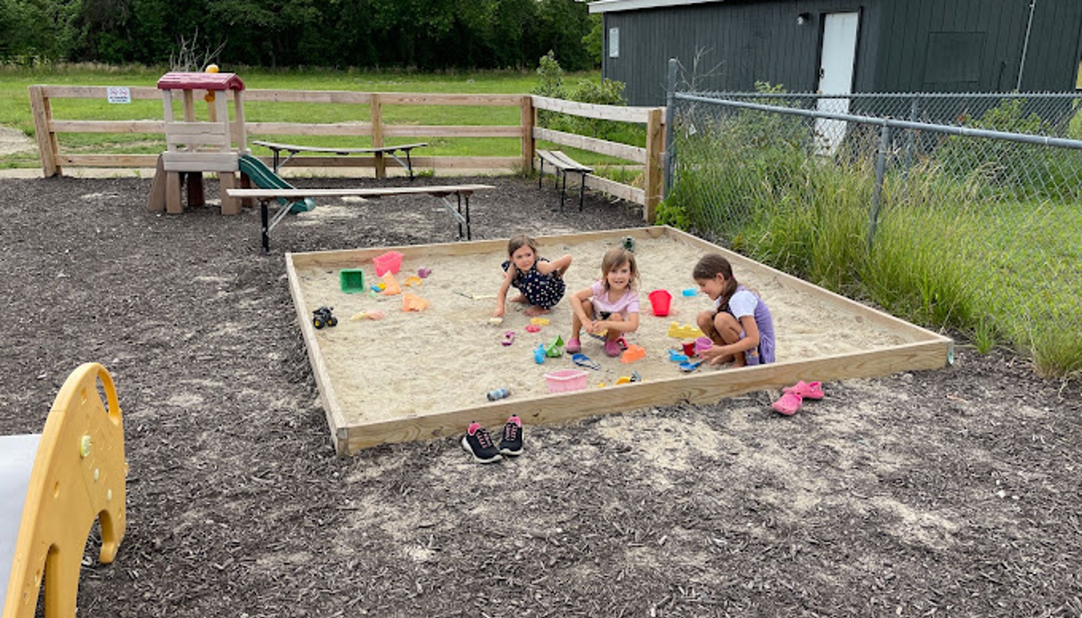 Kids playing in sandbox at Patch Brewing