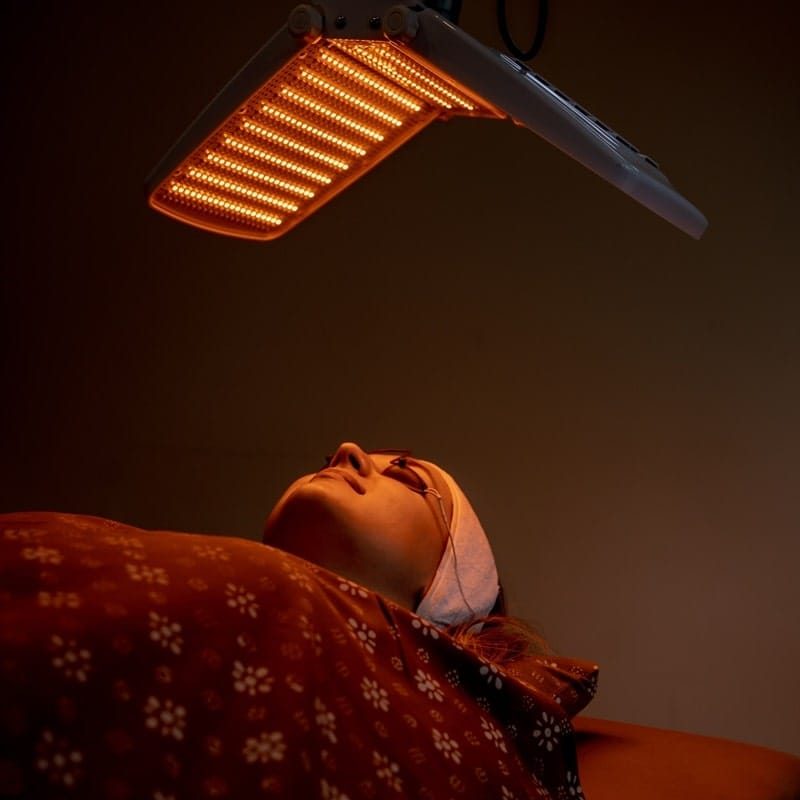 LED light therapy during a facial