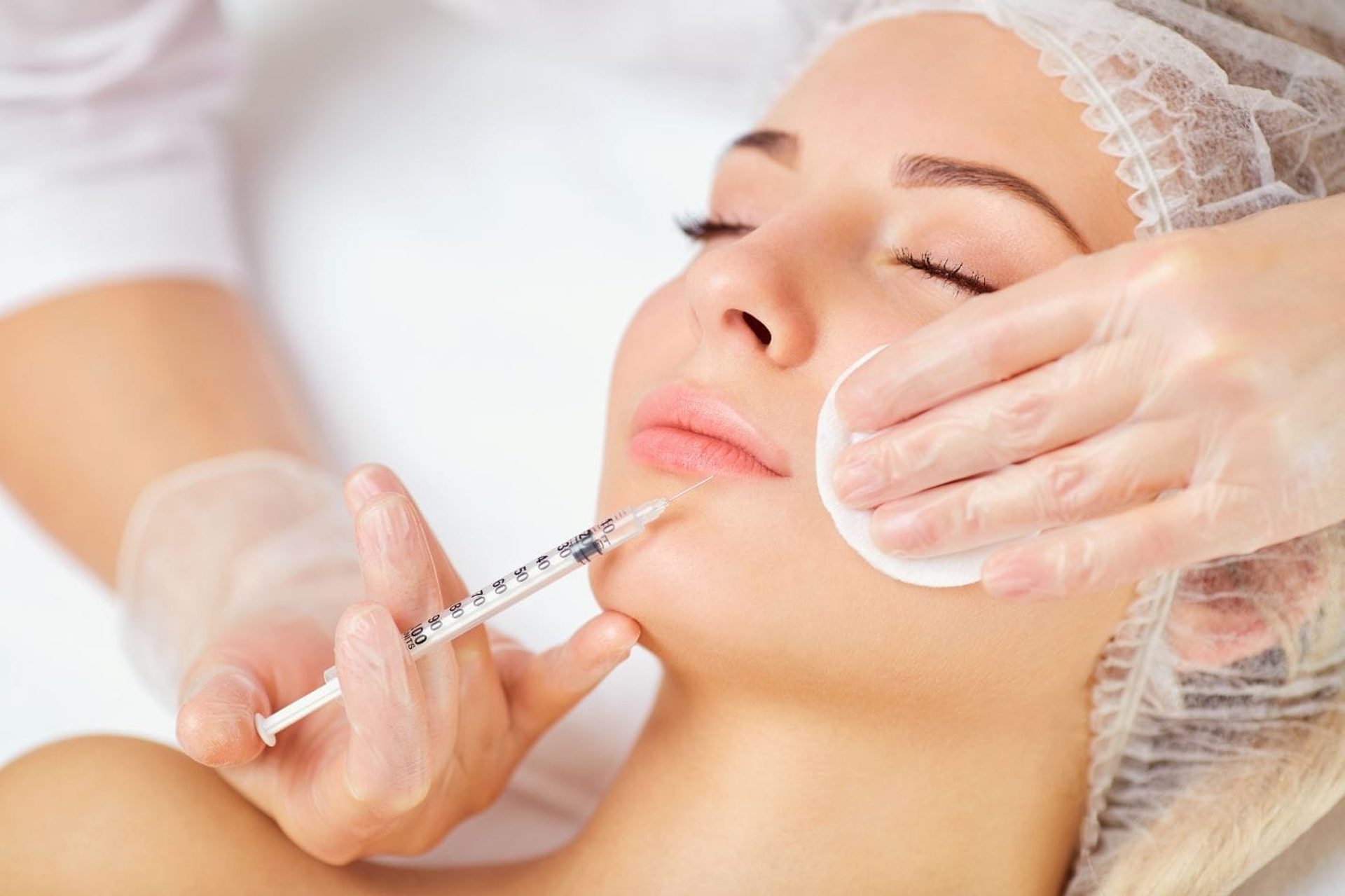 Patient receiving a lip filler treatment