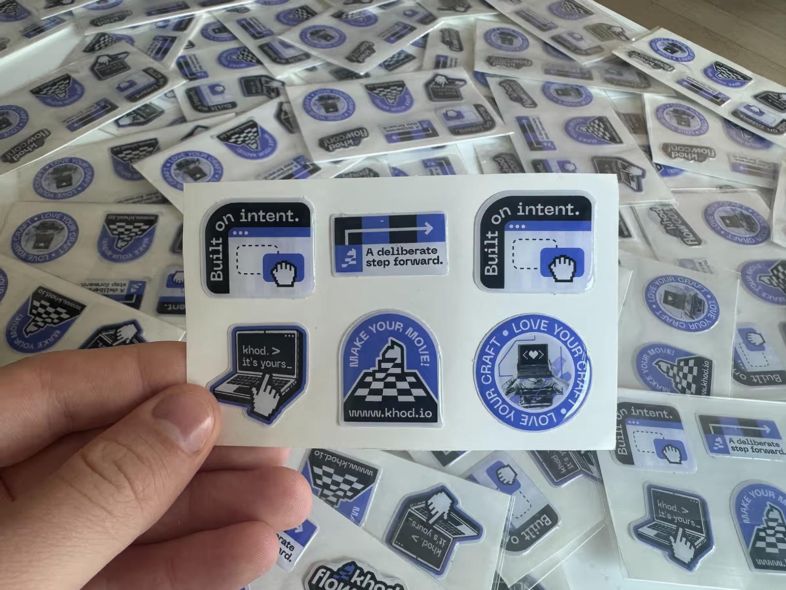 Khod merch at flowConf 2026. The 3D stickers did their job.