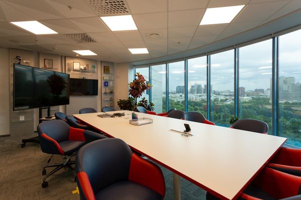 black laptop computer on white table