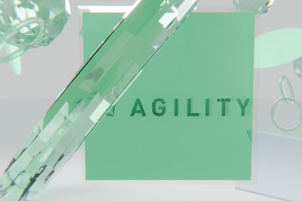 Abstract clear shapes and a green square with 'agility' text.