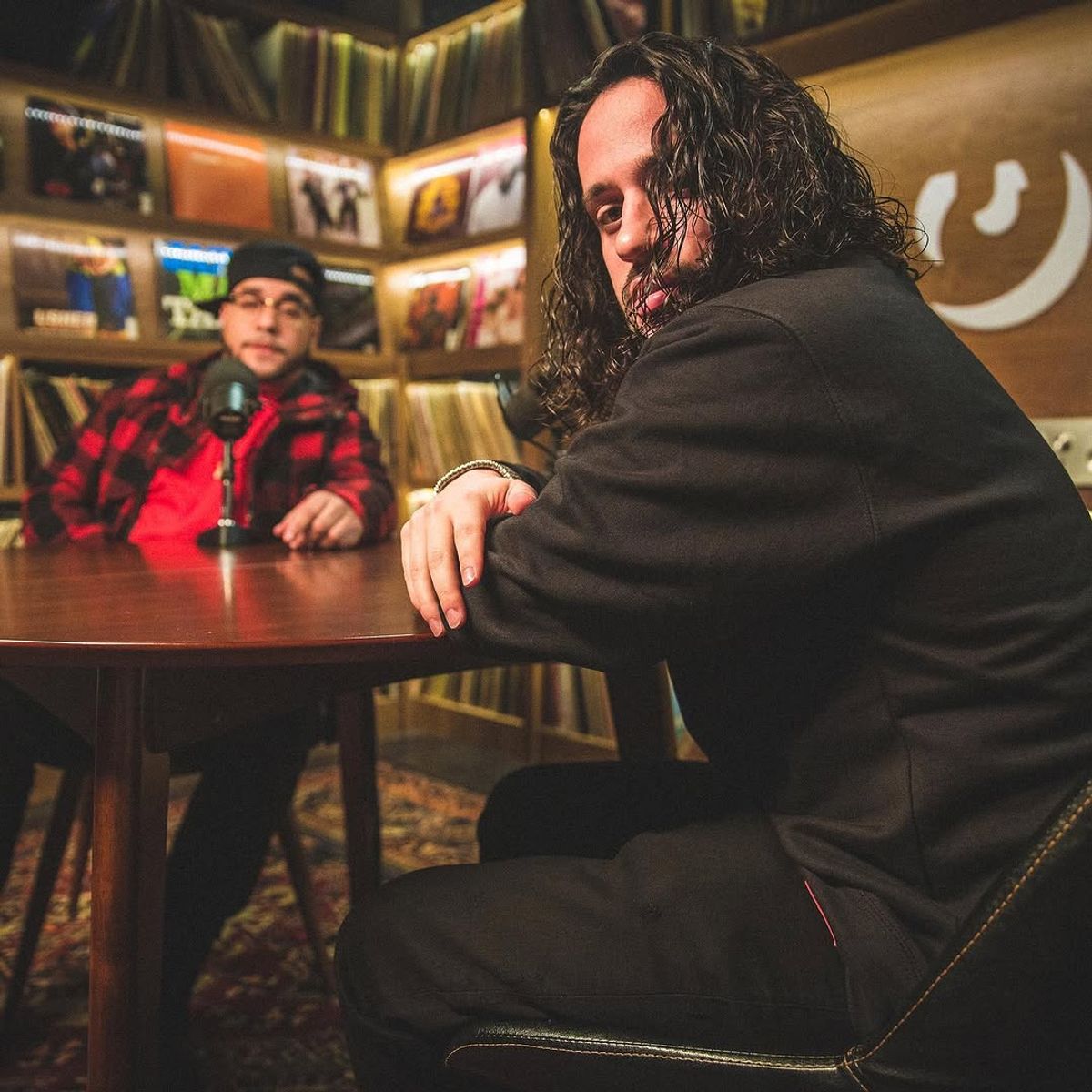 Russ Visits Genius for Real Talk with Rob Markman