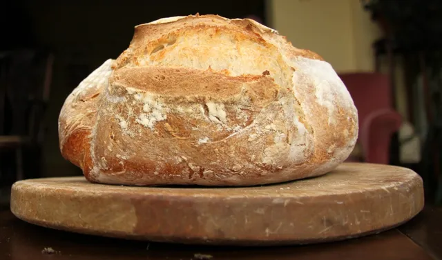 "Sourdough loaf" by muffinn is licensed under CC BY 2.0. To view a copy of this license, visit https://creativecommons.org/licenses/by/2.0/?ref=openverse.