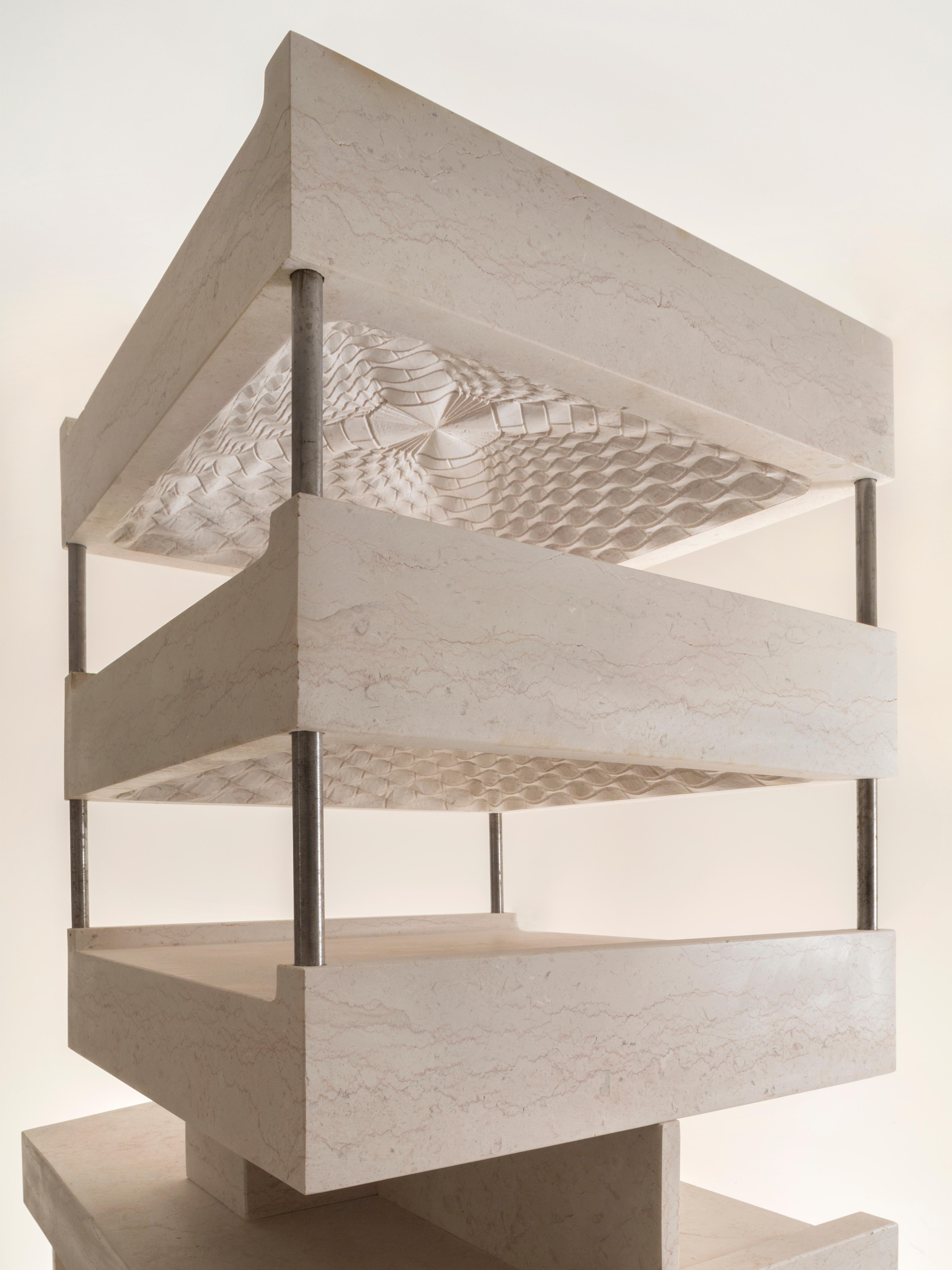 Photo of a stone model of the MMAG building