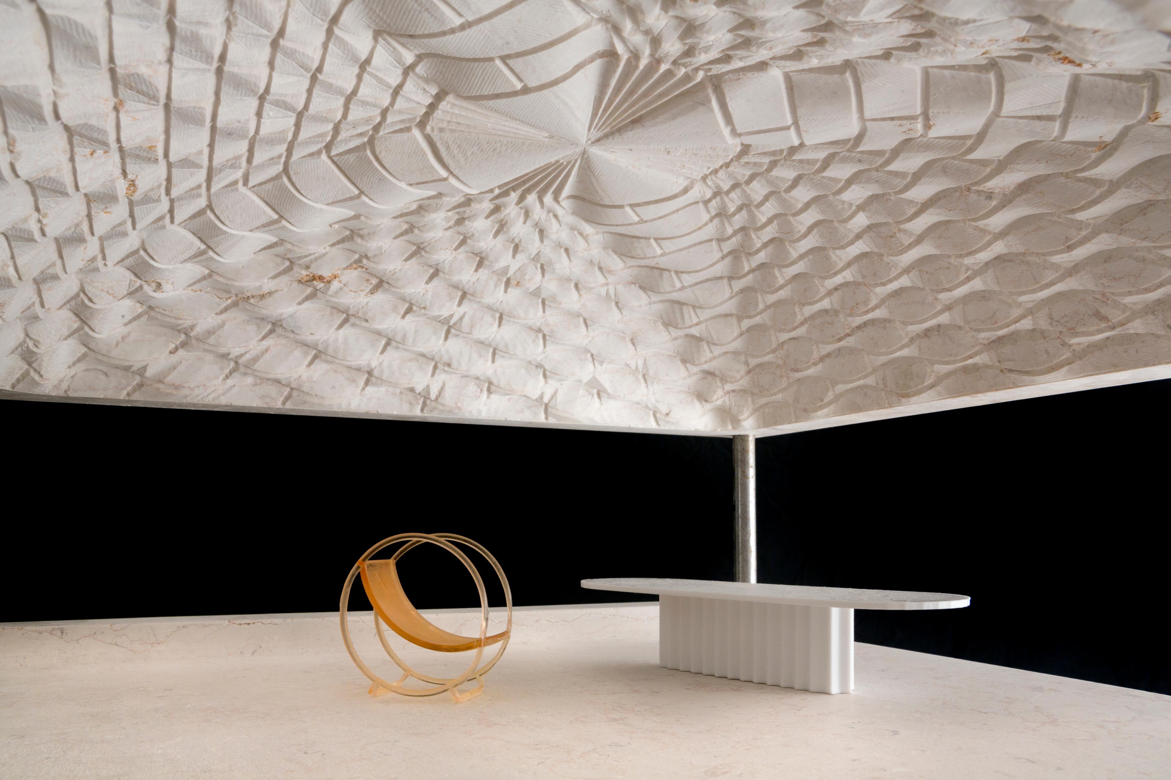 Photo of a stone model of the MMAG building