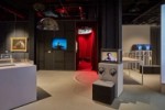 Image showing the galleries and the exterior of the installation, which is surrounded by red velvet curtains, with soundscape by Coda to Coda