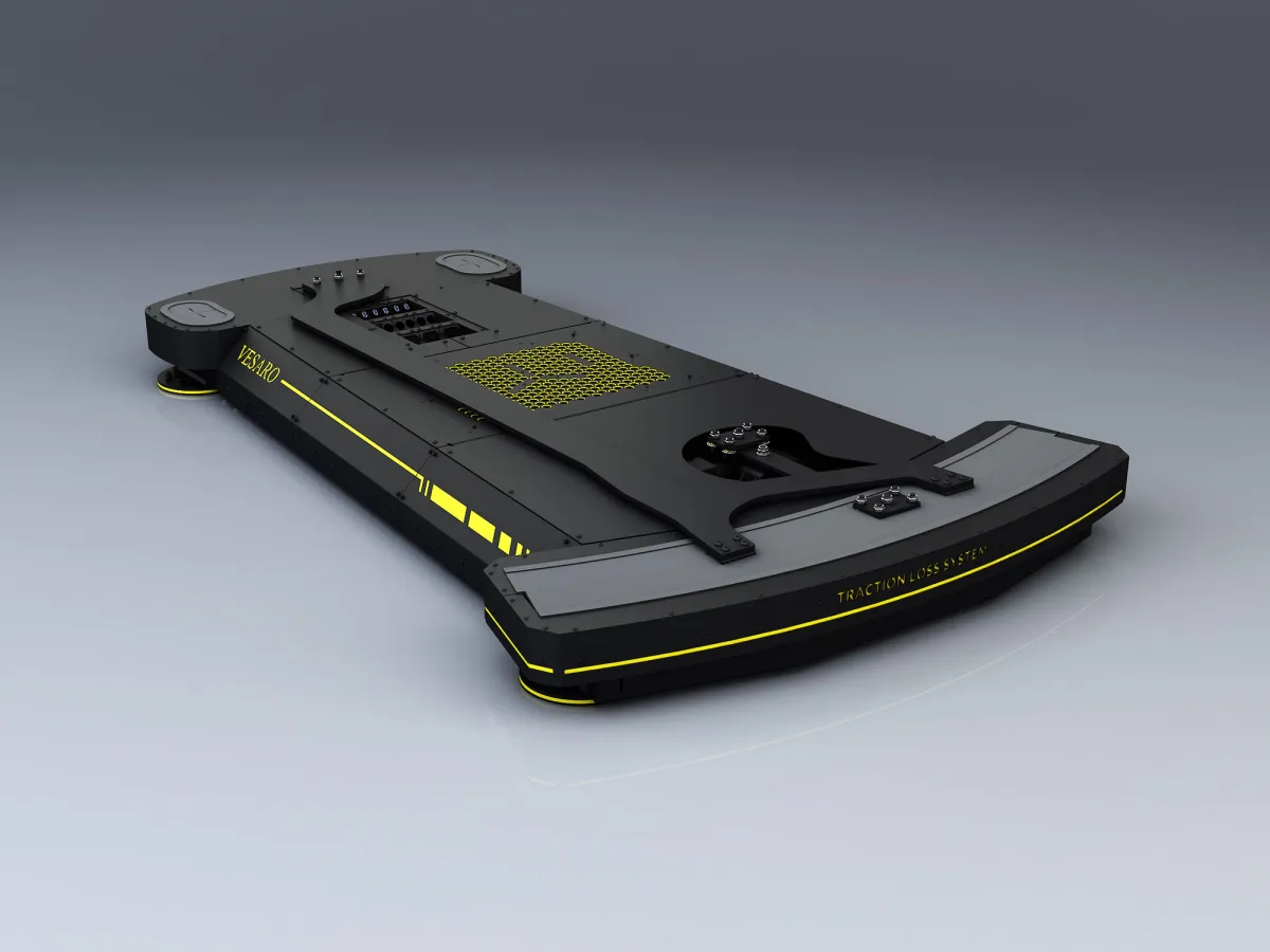 Black and yellow Vesaro motion base viewed from a low front angle on a grey studio background