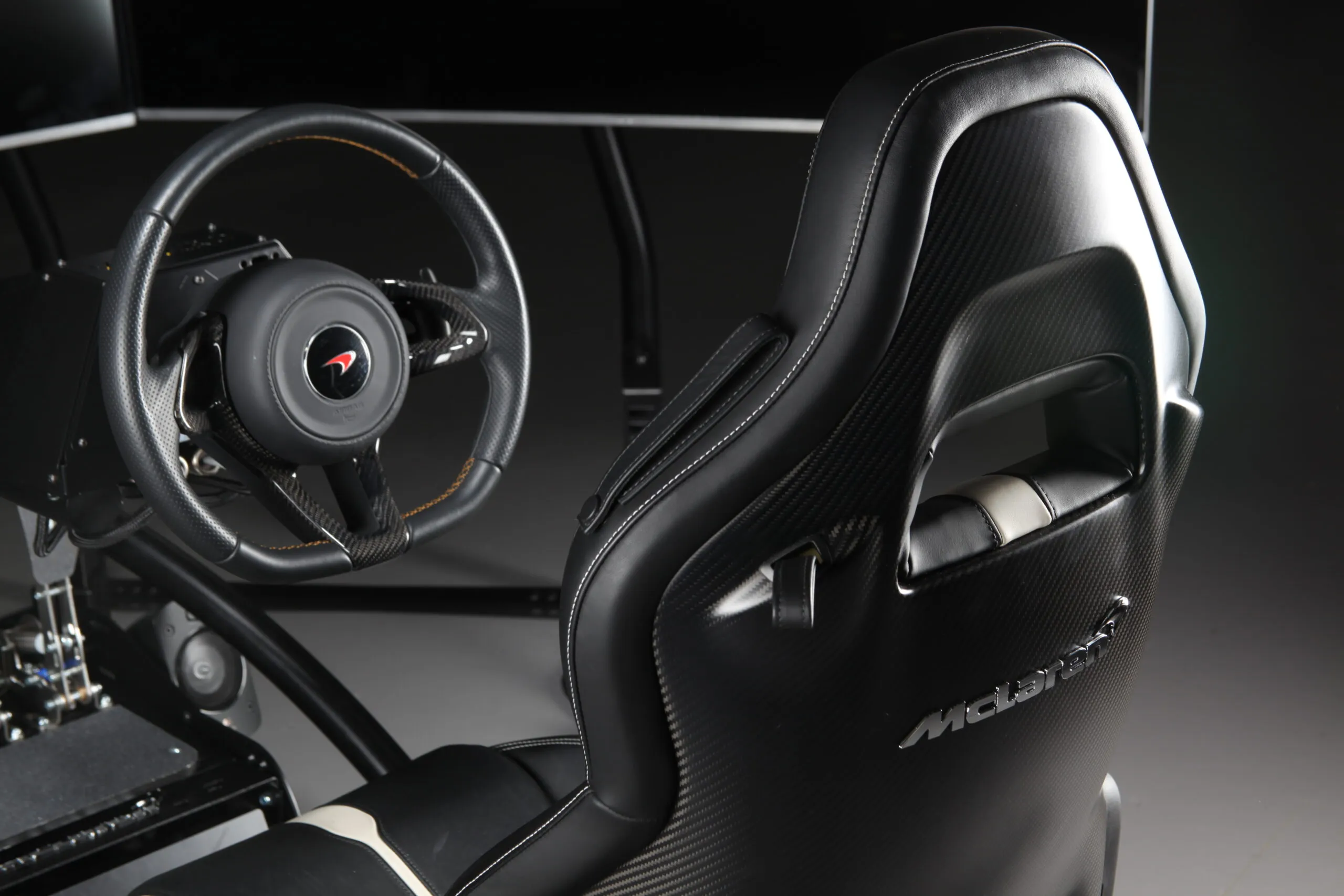 McLaren simulator seat and steering wheel detail