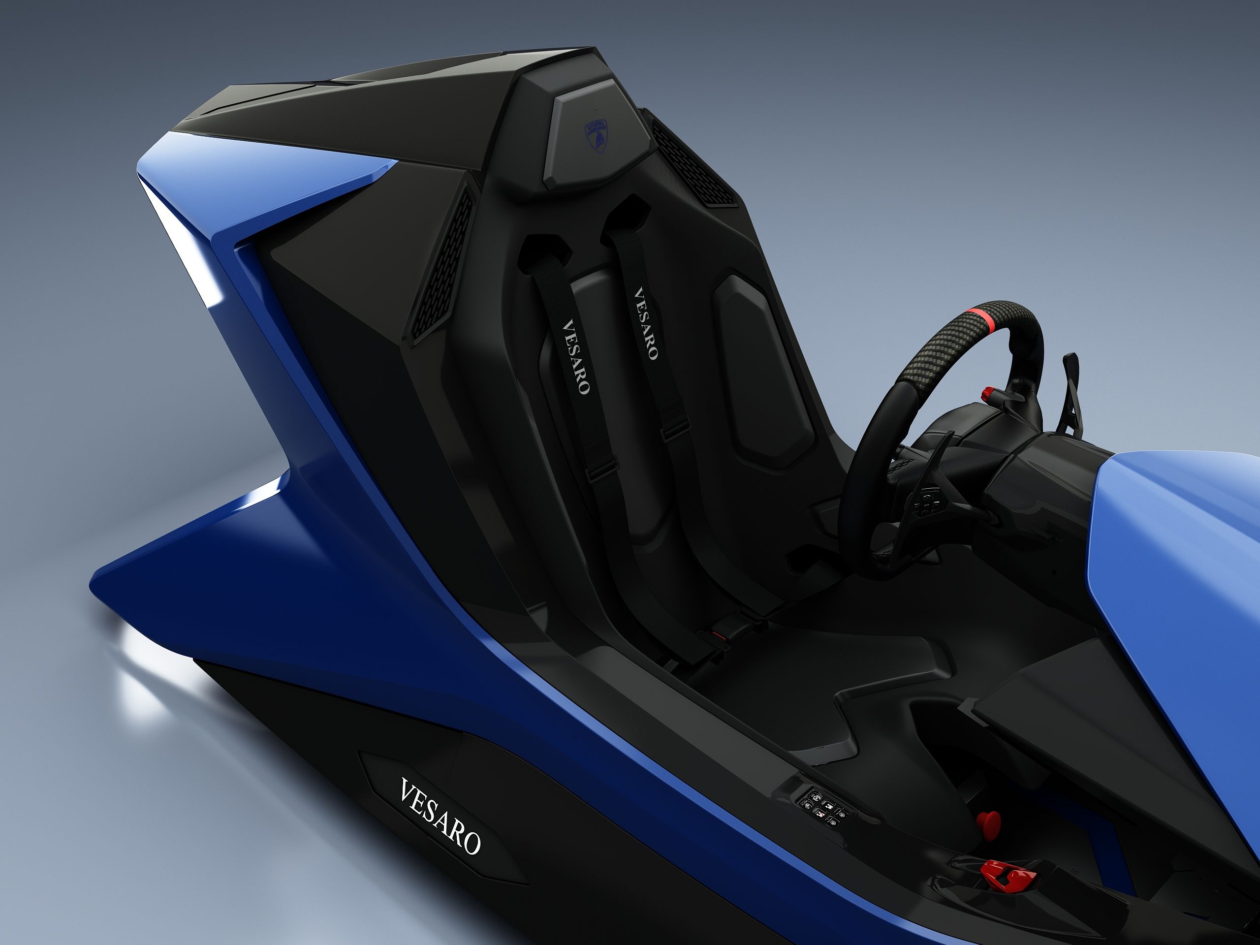 Close-up of the blue Vesaro Lamborghini simulator seat with harness and Vesaro lettering, steering wheel at right