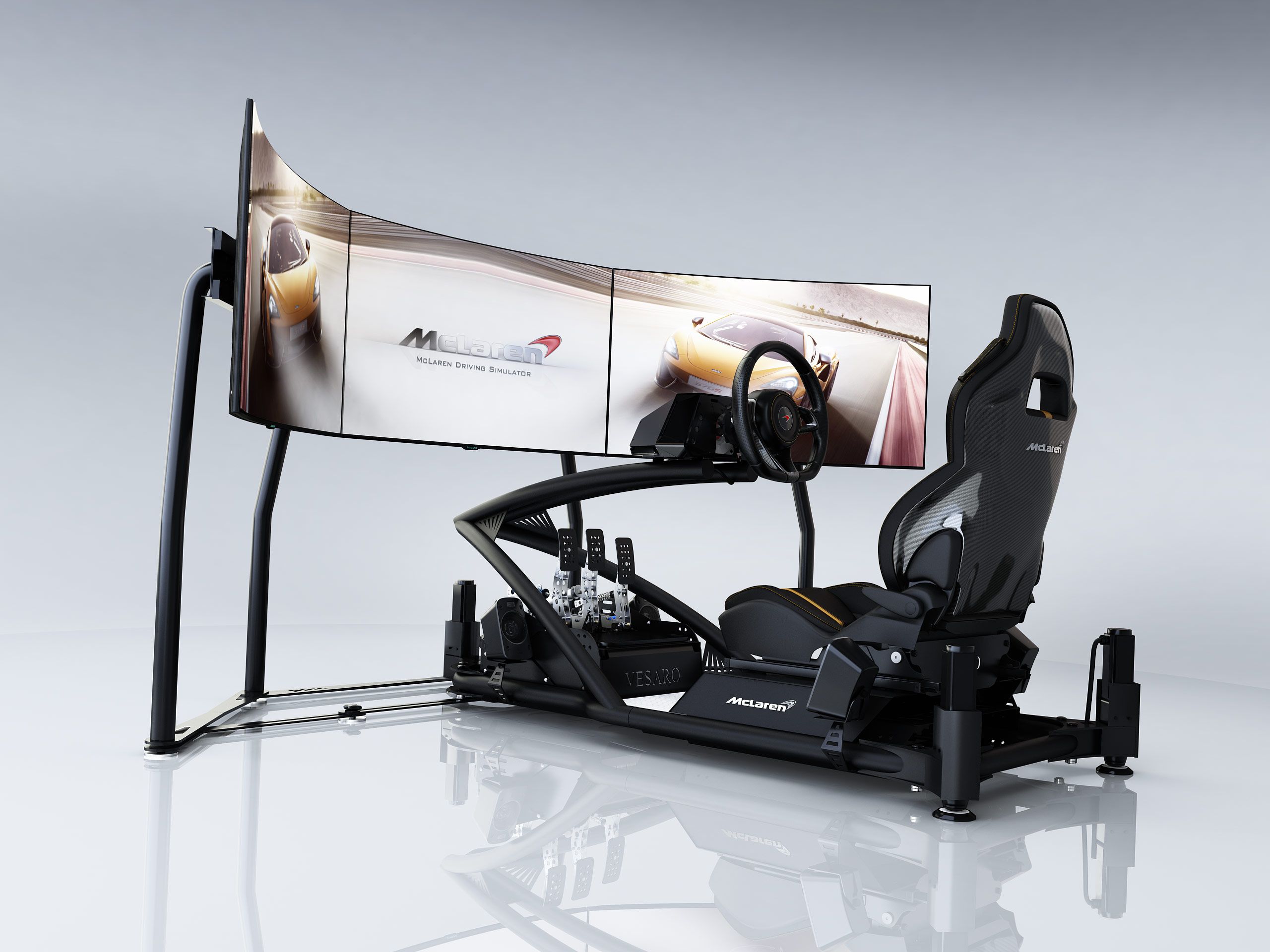 McLaren-branded Vesaro triple-screen racing simulator on a motion base, three-quarter view from the left