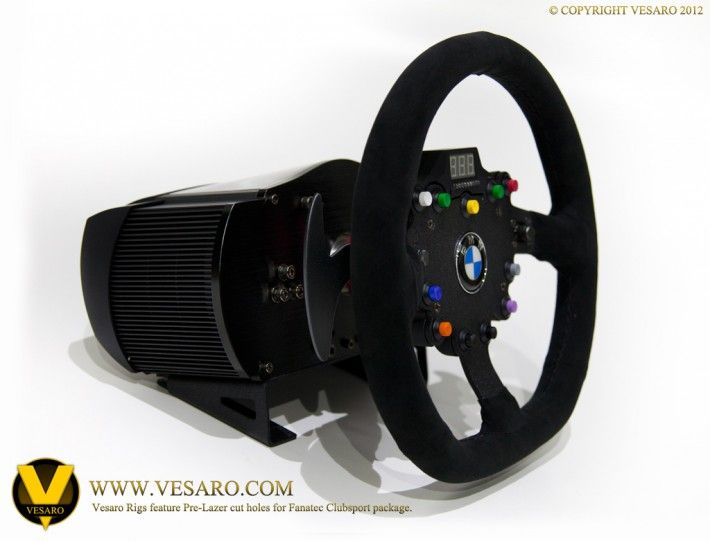 Fanatec Clubsport BMW GT wheel with suede rim and coloured buttons mounted on its wheel base