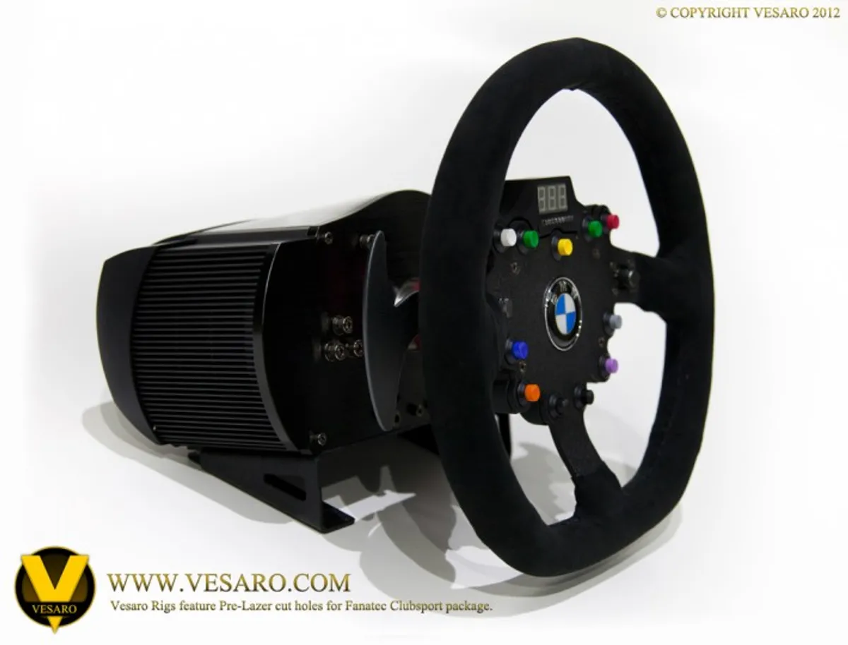 Fanatec Clubsport BMW GT wheel with suede rim and coloured buttons mounted on its wheel base