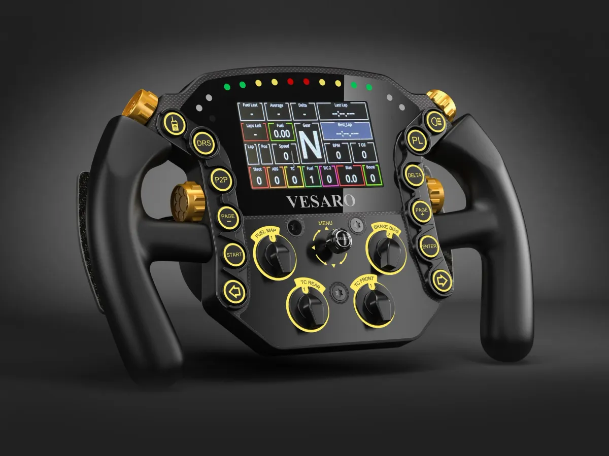 Black Vesaro formula wheel with colour display, gold buttons and yellow-ringed rotary switches