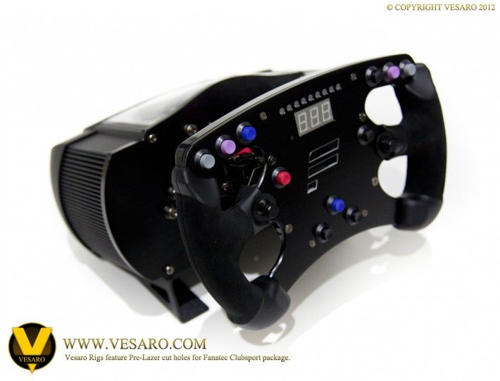 Fanatec Clubsport Formula-style wheel rim with buttons and a digital display on its wheel base
