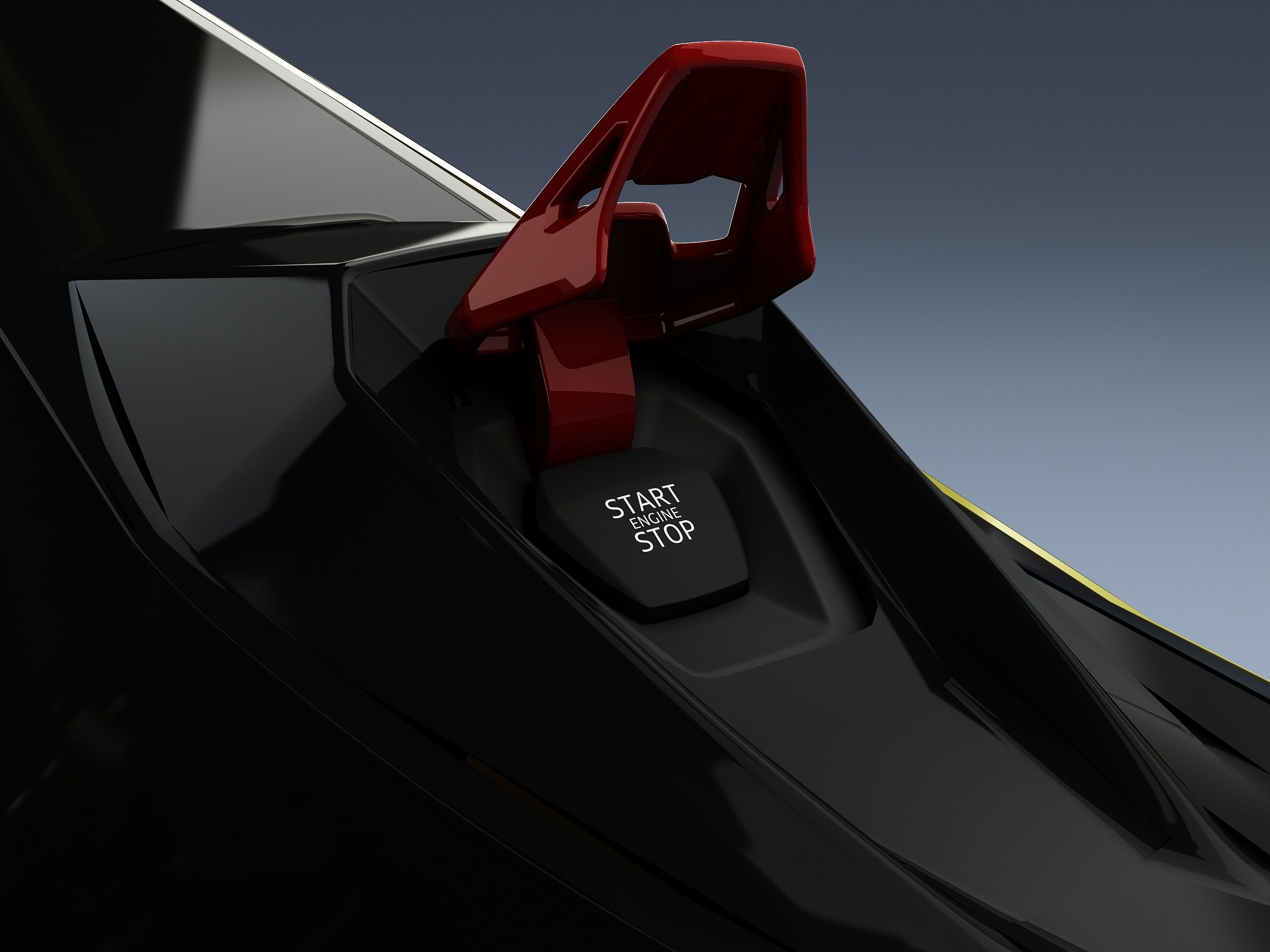 Close-up of the red start-stop engine button and guard on a black and yellow Lamborghini-styled simulator