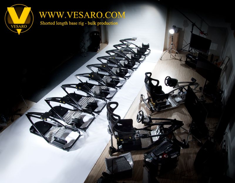 Overhead view of a row of shortened-length Vesaro base rigs lined up in a studio for bulk production