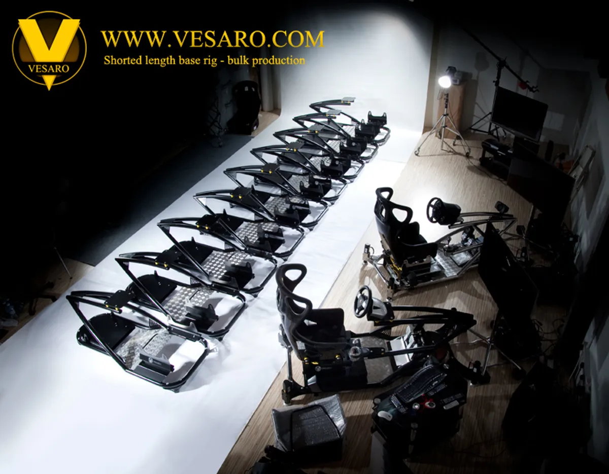 Overhead view of a row of shortened-length Vesaro base rigs lined up in a studio for bulk production