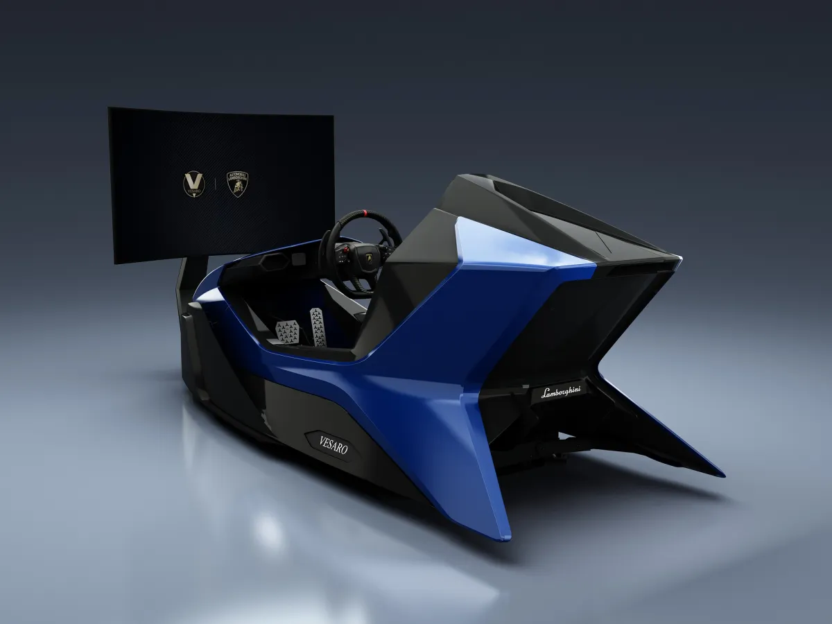 Blue angular Vesaro x Lamborghini racing simulator with curved display bearing partner logos, three-quarter front view