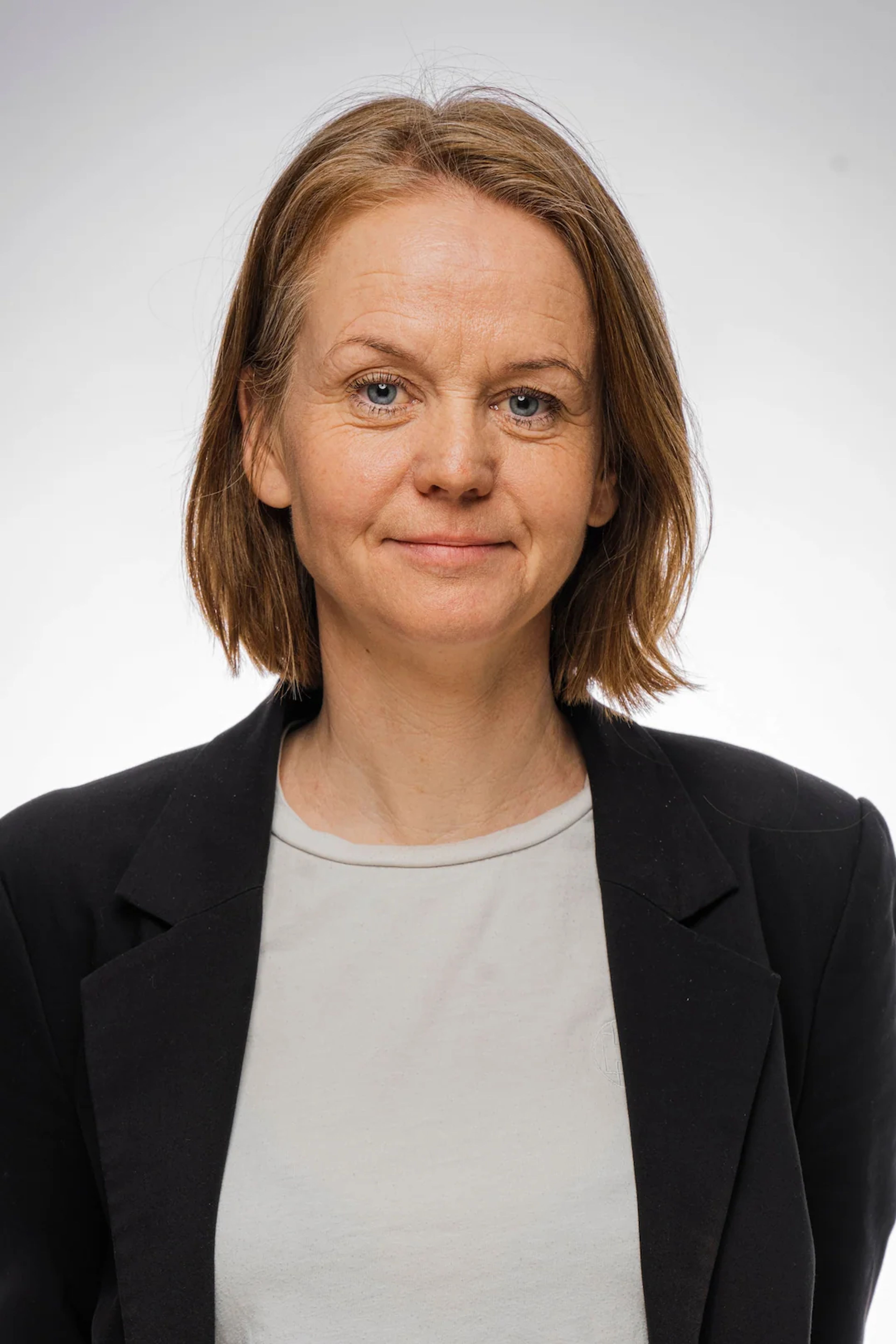 Portrait of Anne Mathilde Wicken, HR Manager at AXTech.