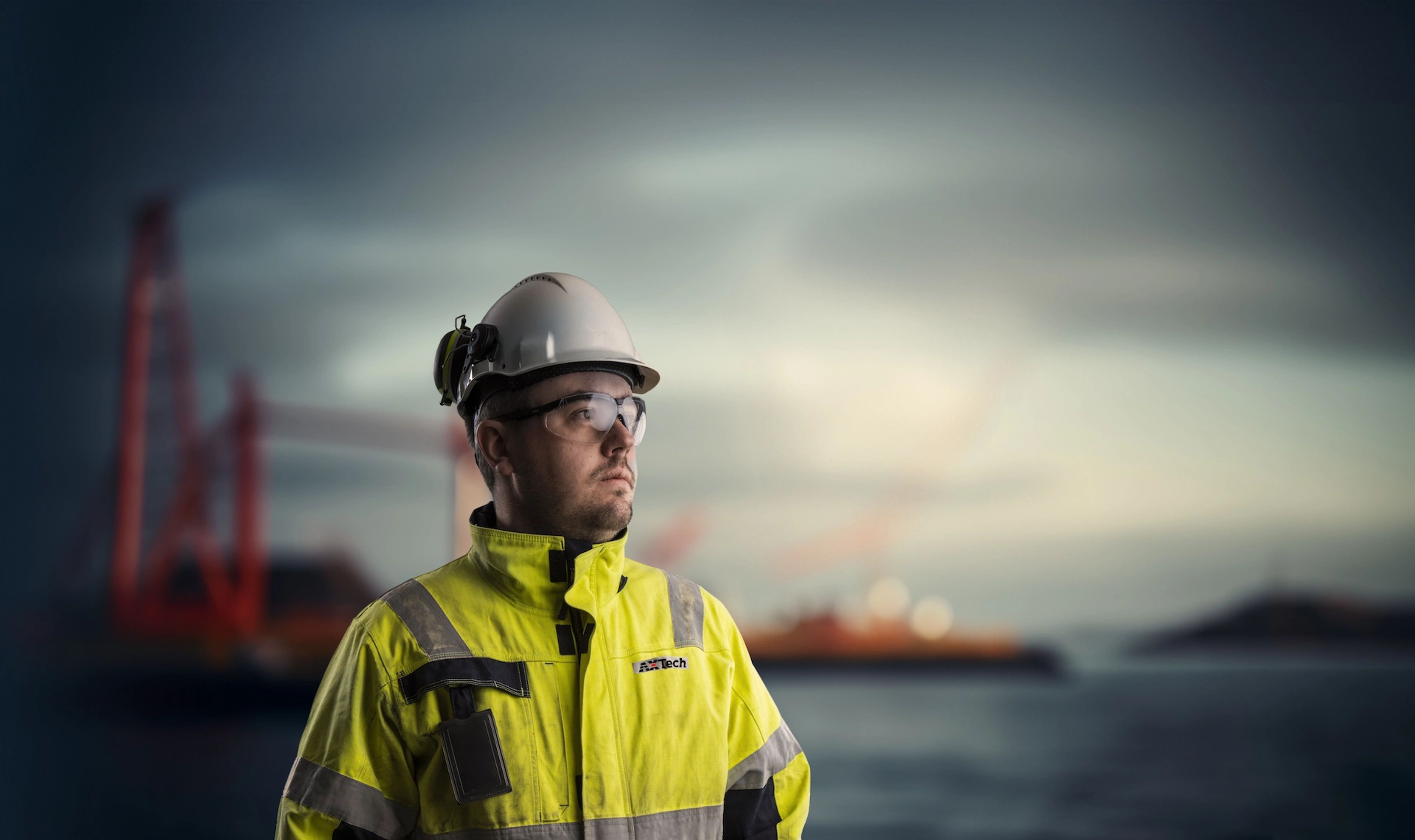 AXTech service technicians maintaining offshore lifting equipment.