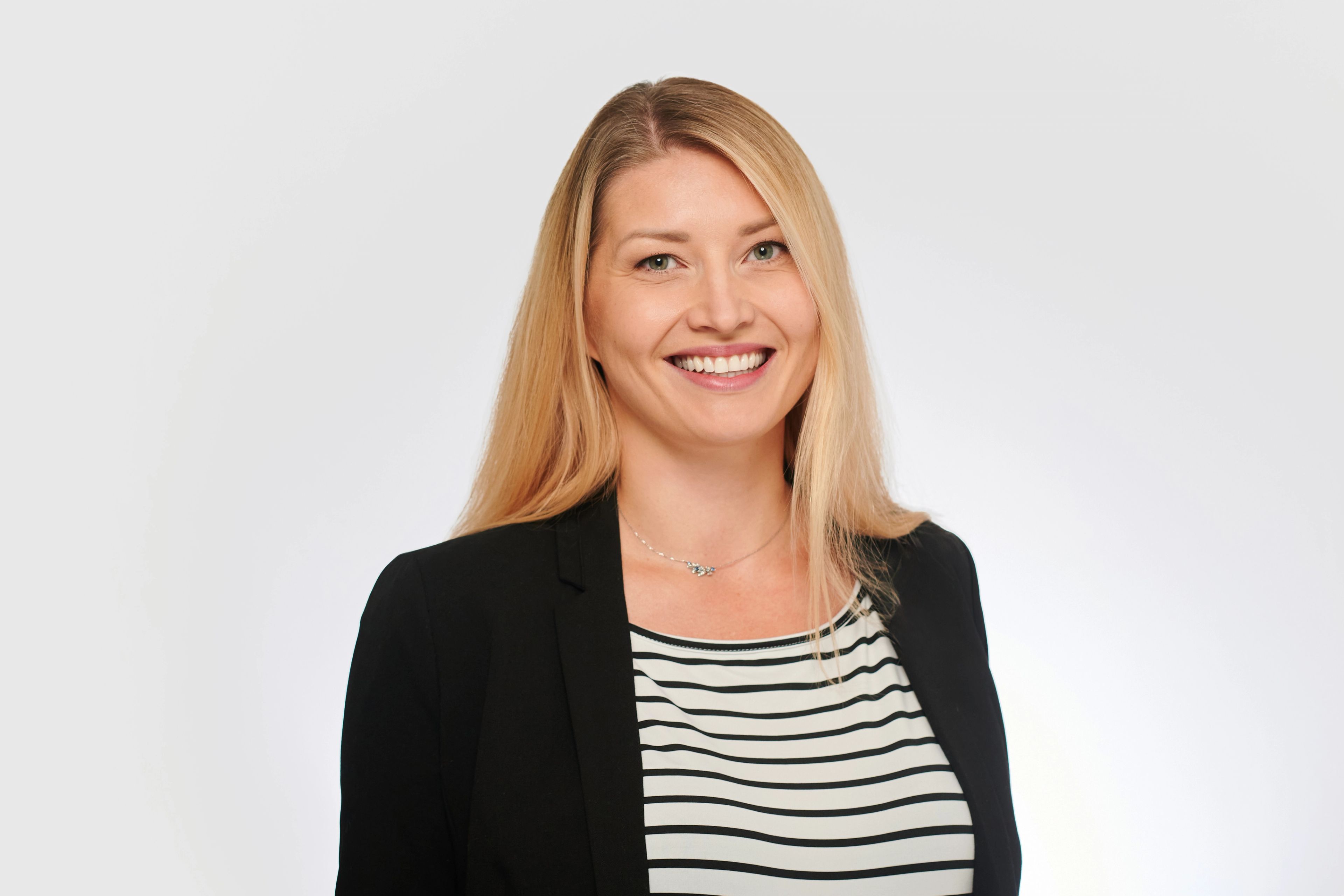 Picture of woman with blond hair smiling